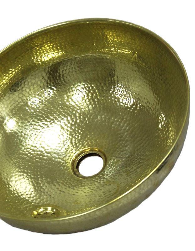 Handcrafted Moroccan copper and brass basin | Black and white tiled exterior | Hammered metal sink | Bathroom sink