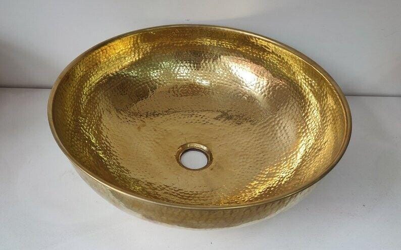Handcrafted Moroccan copper and brass basin | Black and white tiled exterior | Hammered metal sink | Bathroom sink