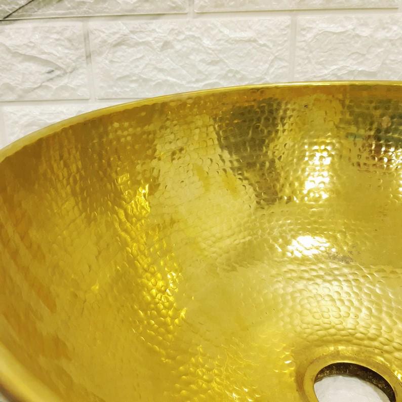 Handcrafted Moroccan copper and brass basin | Black and white tiled exterior | Hammered metal sink | Bathroom sink
