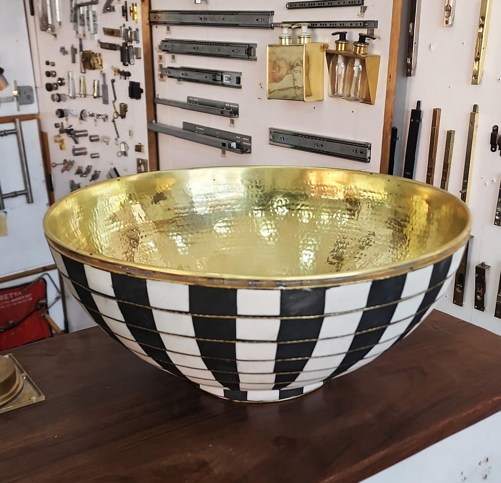 Handcrafted Moroccan copper and brass basin | Black and white tiled exterior | Hammered metal sink | Bathroom sink